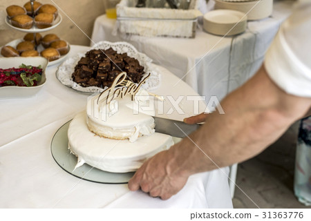 Groom marriage Cutting the Wedding Cake together 31363776