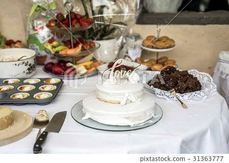 Beautiful wedding cake with cream With text Love Beautiful wedding cake with cream With text Love 31363777