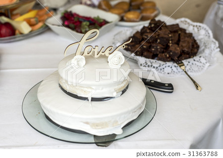 Beautiful wedding cake with cream With text Love Beautiful wedding cake with cream With text Love 31363788