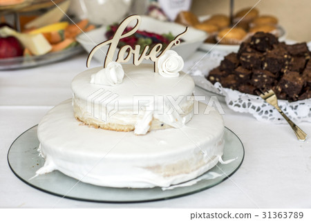 Beautiful wedding cake with cream With text Love Beautiful wedding cake with cream With text Love 31363789