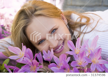 Pretty girl in the flowers 31374596