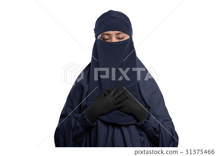 Religious asian muslim woman wearing hijab and niqab 31375466