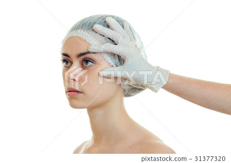 a young girl with a special cap for hair without 31377320