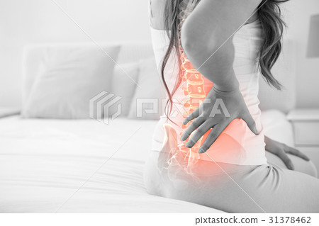 Digital composite of highlighted spine of woman 31378462