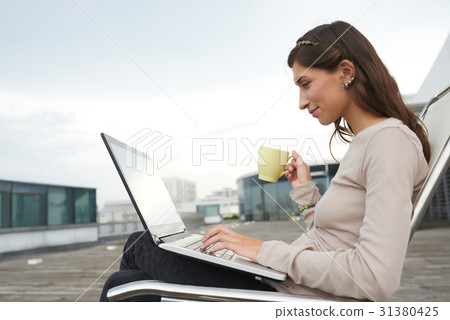 On a rooftop 31380425