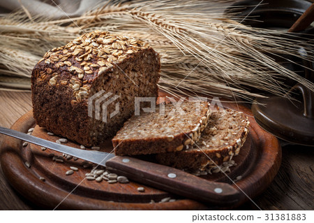 Whole Grain rye bread with seeds. 31381883