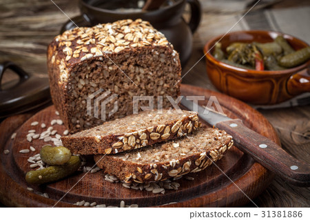 Whole Grain rye bread with seeds. 31381886