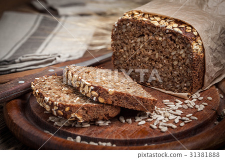 Whole Grain rye bread with seeds. 31381888