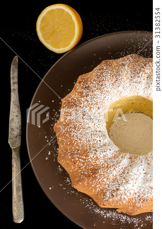 Homemade vanilla bundt cake and vintage knife 31382554