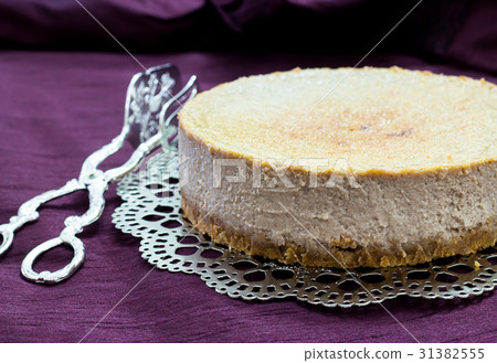 Chestnut cheesecake ice cream on a silver platter Chestnut cheesecake ice cream on a silver platter 31382555