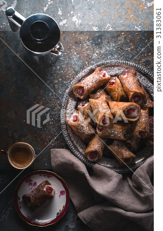 Sacilia tubules cannoli on a tin plate Sacilia tubules cannoli on a tin plate 31383061