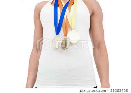 Female athlete wearing medals 31383468