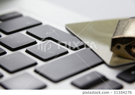 Metallic lock with smart card on laptop Metallic lock with smart card on laptop 31384276