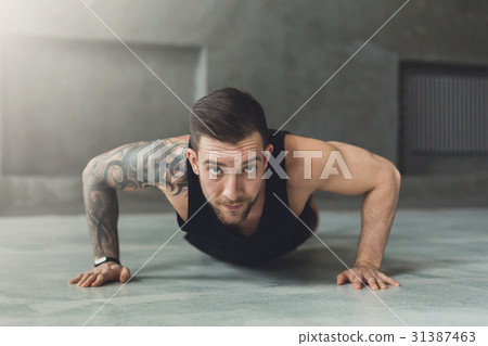 Young man fitness workout, push ups 31387463