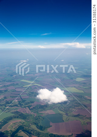 Blue sky background with tiny clouds Blue sky background with tiny clouds 31388174