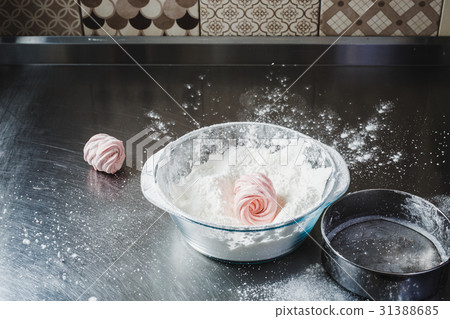 Cooking marshmallows in a professional kitchen Cooking marshmallows in a professional kitchen 31388685