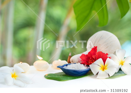 Spa concept herb salt plumeria flowers tropic leaf 31389192