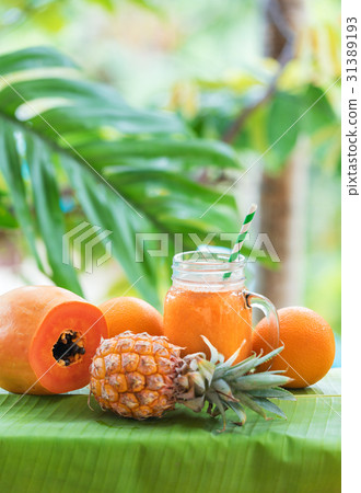Tropical exotic pineapple papaya fruits juice Tropical exotic pineapple papaya fruits juice 31389193
