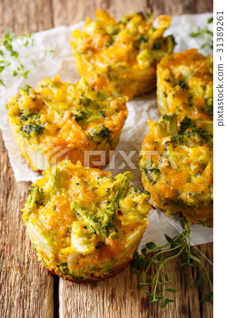 Healthy snack Broccoli muffins with cheddar cheese 31389261