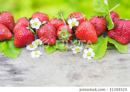 Perfect aroma sweet strawberry border on wood 31389329