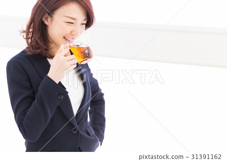 Woman drinking tea business 31391162