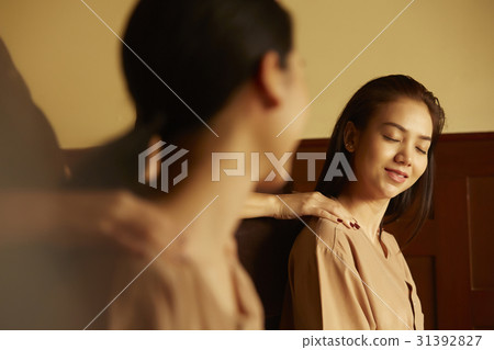 Two women are enjoying shoulder massage in spa salon. Two women are enjoying shoulder massage in spa salon. 31392827