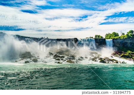 Water rushing over Niagara Falls Water rushing over Niagara Falls 31394775