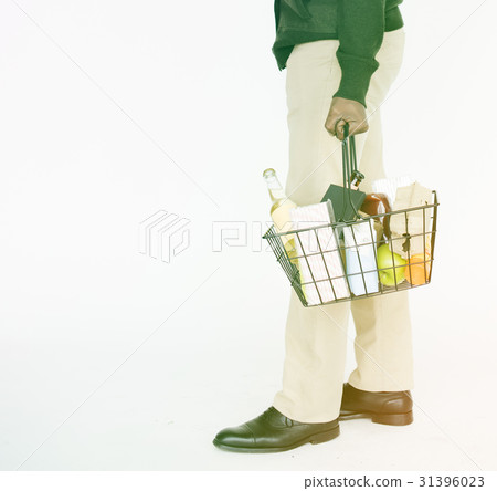 Man Holding Shopping Basket Studio 31396023