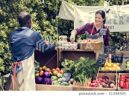 Greengrocer preparing organic fresh agricultural product at farm Greengrocer preparing organic fresh agricultural product at farm 31398505