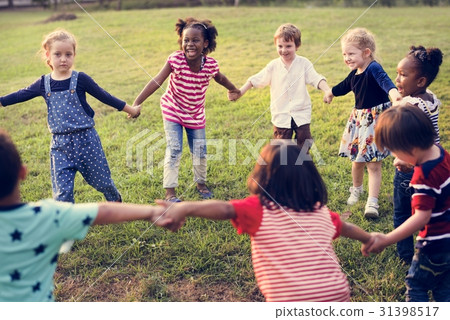 Group of Diverse Kids Playing at the Field Together 31398517