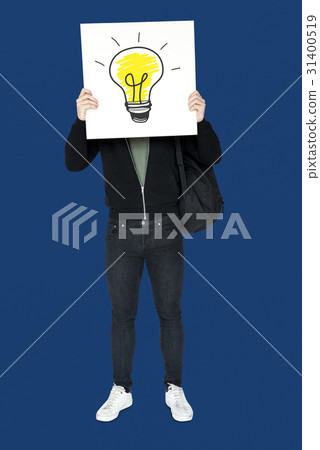 Man holding banner with light bulb symbol cover his face Man holding banner with light bulb symbol cover his face 31400519
