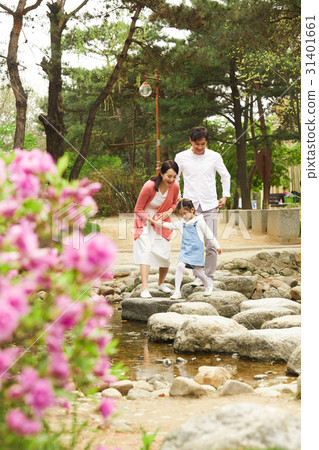 Happy family of three Happy family of three 31401661