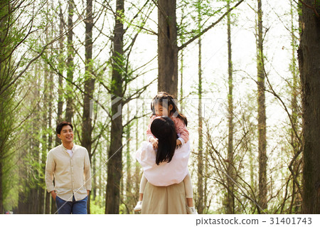 Happy family of three 31401743