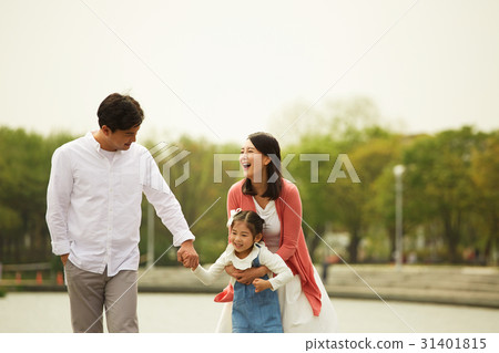 Happy family of three 31401815