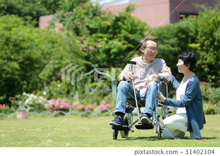 Caring image fresh green wheelchair 31402104