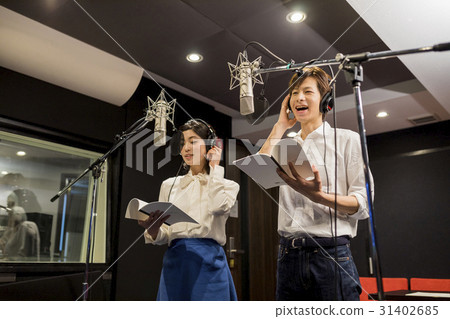 Men and women recording 31402685