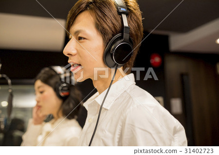 Men and women recording Men and women recording 31402723