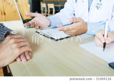 patient listening intently male doctor explaining 31404116