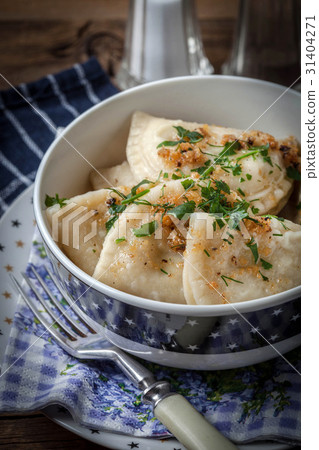Dumplings with meat, onion and bacon. Dumplings with meat, onion and bacon. 31404271