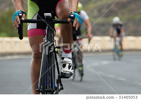 Cycling competition,cyclist athletes riding a race Cycling competition,cyclist athletes riding a race 31405053