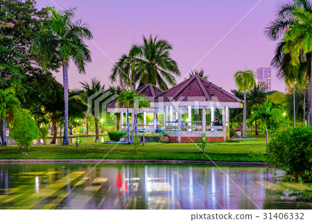 Lakeside pavilion with nature at night 31406332