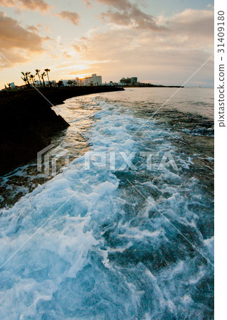 Sunset and sea waves in the Mediterranean Sea Sunset and sea waves in the Mediterranean Sea 31409180