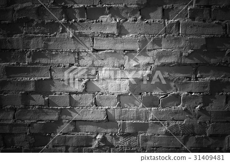 Black brick wall with spot illumination, texture 31409481