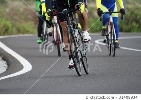 Cycling competition,cyclist athletes riding a race 31409934