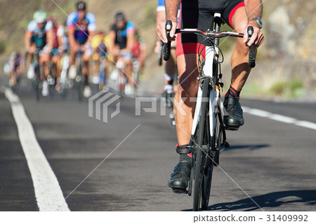 Cycling competition,cyclist athletes riding a race 31409992