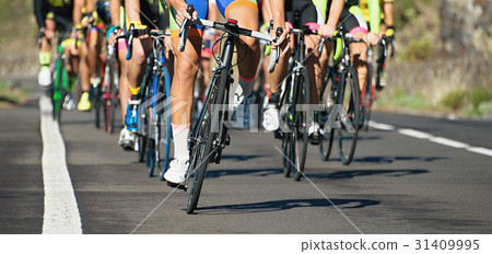 Cycling competition,cyclist athletes riding a race 31409995