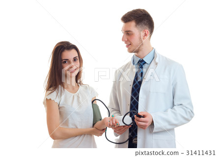 woman takes the pressure and smiles woman takes the pressure and smiles 31411431