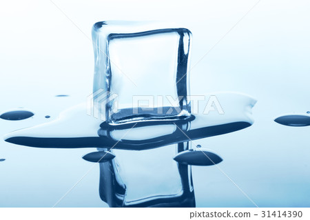 Melting ice cube with reflection isolated on white Melting ice cube with reflection isolated on white 31414390