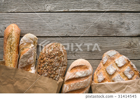 Bread bakery background. Brown and white wheat Bread bakery background. Brown and white wheat 31414545