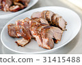 Preparing meat on the table 31415488